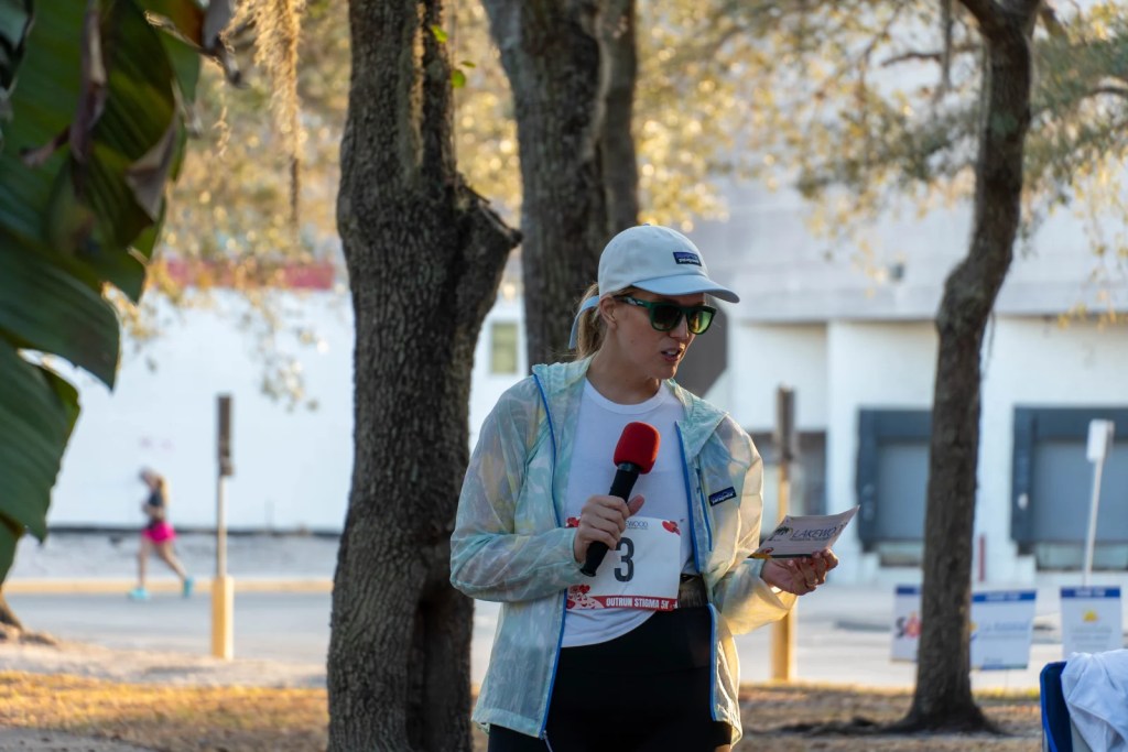 Race announcer with a microphone